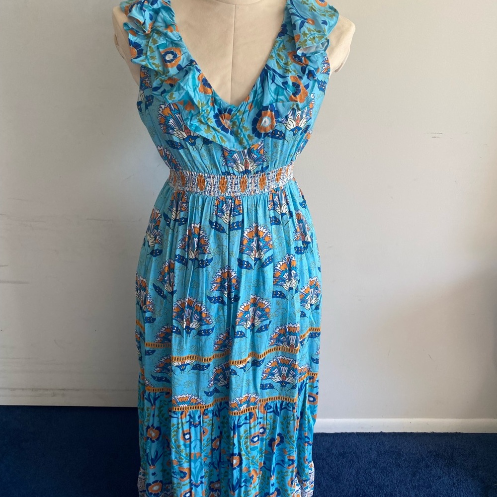 Vibrant Floral Maxi Dress in Blue with floral design. NWT has slit pockets